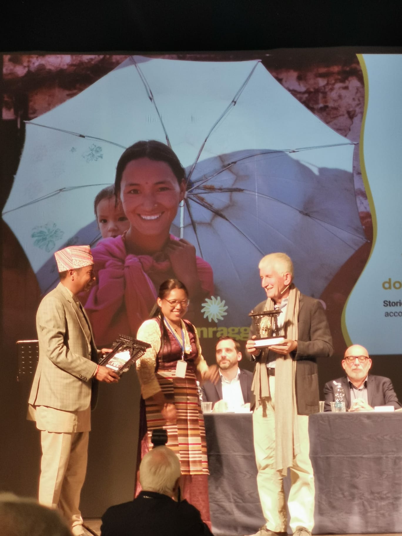 Photo of Receiving award for women empowerment advocacy  From ETS Italy.
